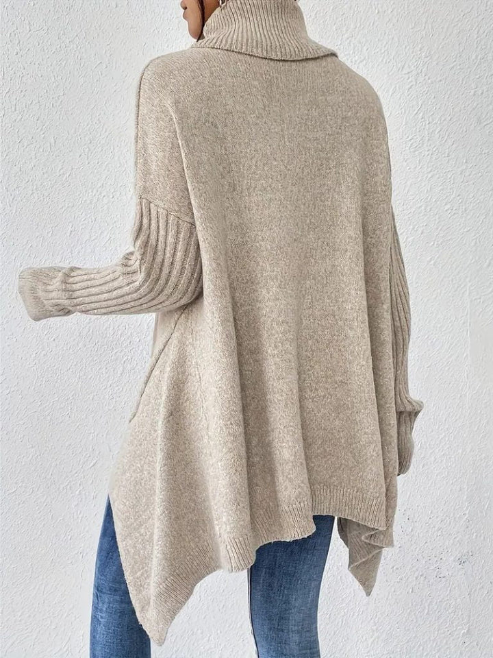 Women's Oversized Turtleneck Sweater with Asymmetric Hem